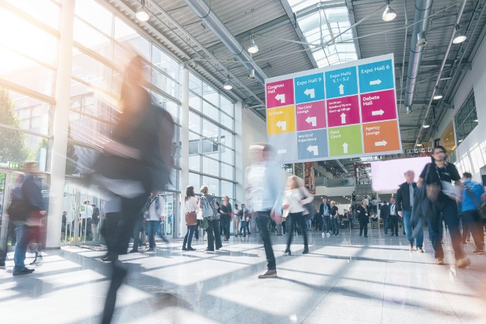 blurred people in a modern hall